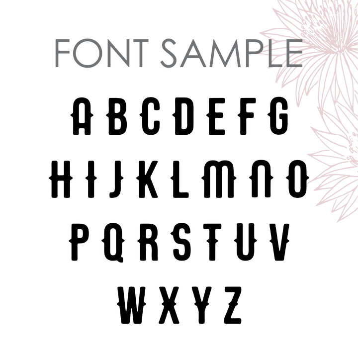 Vintage Wall Lettering features bold, black bamboo-style uppercase English letters in a stylized font, with decorative flowers on a light background—perfect for personalized decor or custom wall-mount names.