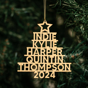 The Whānau Christmas Tree Bauble is a personalised wooden ornament, engraved with Indie, Kylie, Harper, Quintin, Thompson and 2024, and features a star on top—perfect for hanging beautifully on your Christmas tree.