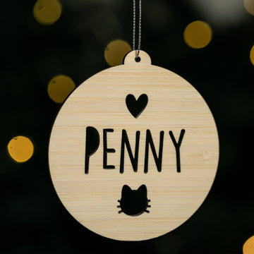 Round wooden ornament with &