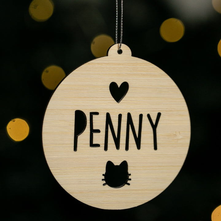 Round wooden ornament with &