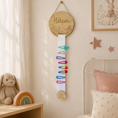 Children's room with personalised bamboo bow and clip hanger from Love from Seventeen