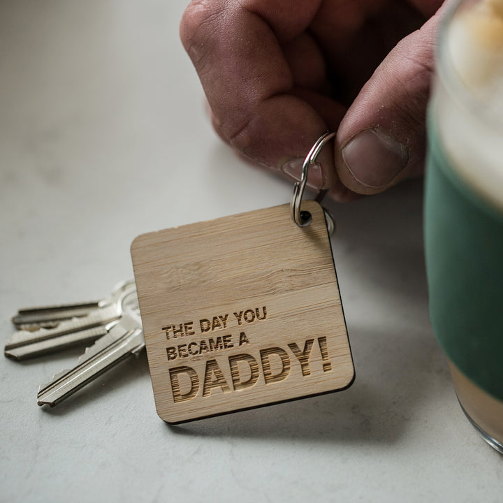 Bamboo keyring saying the day you became a Daddy!
