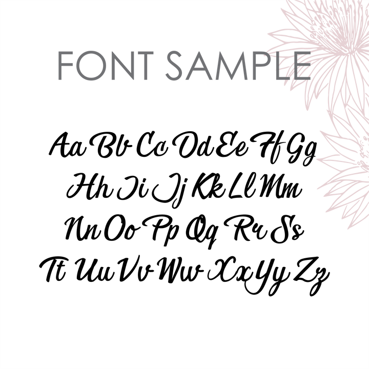 A script font sample shows A–Z in black on a light background with a faint floral design in the top right. The gray heading reads FONT SAMPLE—ideal for your personalised &