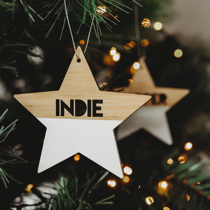 Two wooden Christmas stars with &