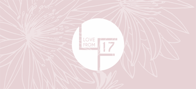 A pink voucher with a white floral arrangement and the Love From 17 logo. 