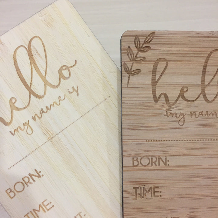 A close up of the Birth Announcement Card showing the difference between light and dark bamboo.