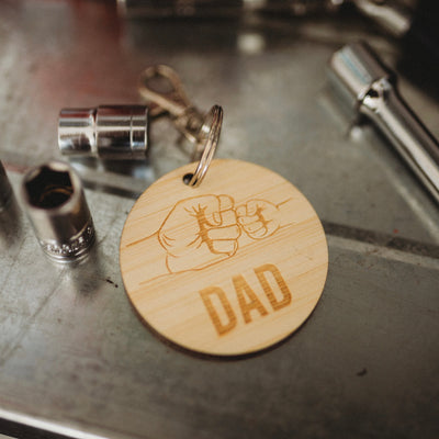 Light bamboo Dad keyring with Dad and child fists together