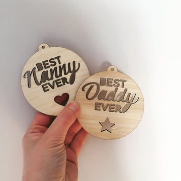 A round bamboo Best Ever Christmas Bauble personalised with a name, handcrafted in New Zealand by Love from Seventeen.